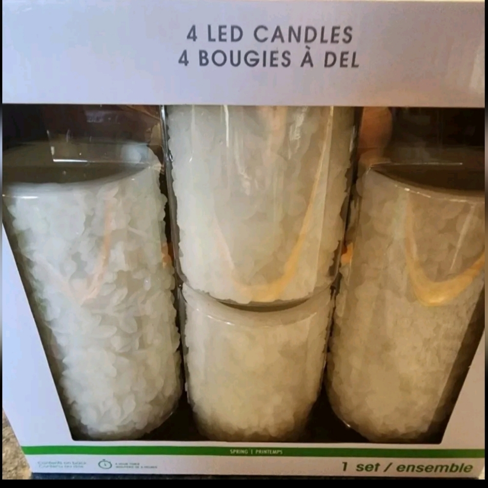 New 4 pc led candle set . $48retail